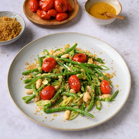Bonensalade met miso yuzudressing en sesampanko